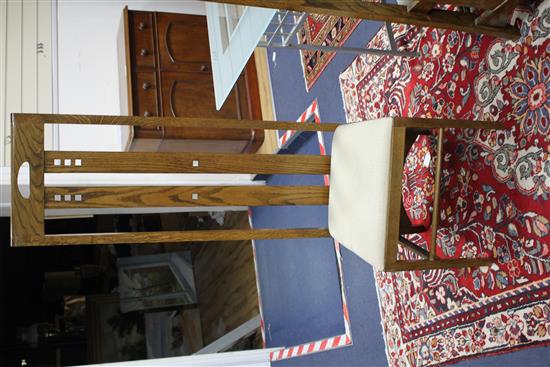 A set of six MacKintosh style oak high-backed dining chairs